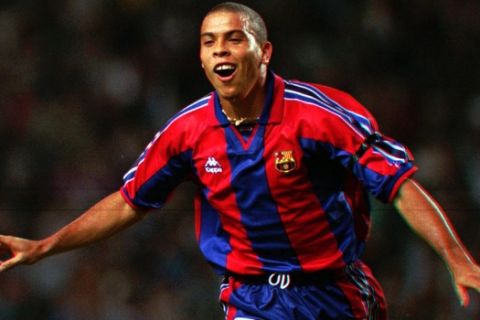 FILE - In this Sept. 12, 1996, file photo, F.C. Barcelona's Brazilian striker Ronaldo celebrates after scoring a goal during a Cup Winner's Cup 1st. round 1st leg soccer match against AEK Larnica of Cyprus in Bracelona, Spain. Ronaldo says on Monday, Feb. 14, 2011, he is retiring from soccer because he can't stay fit anymore, ending a stellar 18-year career in which he thrived with Brazil and some of Europe's top clubs. (AP Photo/Denis Doyle)