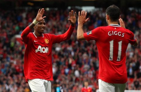 MANCHESTER, ENGLAND - AUGUST 28:  Ashley Young of Manchester United celebrates with Ryan Giggs after scoring his second goal during the Barclays Premier League match between Manchester United and Arsenal at Old Trafford on August 28, 2011 in Manchester, England.  (Photo by Alex Livesey/Getty Images)