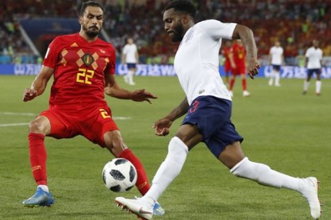 Belgium's Nacer Chadli, left, and England's Danny Rose vie for the ball during the group G match between England and Belgium at the 2018 soccer World Cup in the Kaliningrad Stadium in Kaliningrad, Russia, Thursday, June 28, 2018. (AP Photo/Petr David Josek)