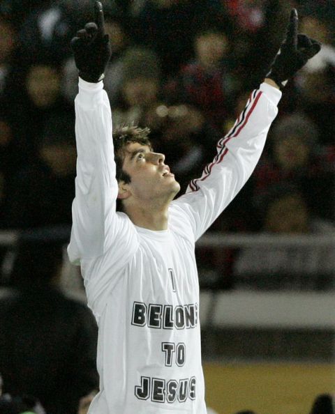 AC Milan's Kaka pulls up his jersey to reveal a t-shirt which reads "I Belong To Jesus" and points to the sky after scoring his team's third goal against Boca Juniors during the second half of the final match of the FIFA Club World Cup soccer championship in Yokohama, Japan Sunday, Dec. 16, 2007. AC Milan won the match 4-2. (AP Photo/Koji Sasahara)