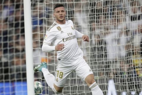 Real Madrid's Luka Jovic turns after scoring a goal that was disallowed for offside position during a Spanish La Liga soccer match between Real Madrid and Leganes at the Santiago Bernabeu stadium in Madrid, Spain, Wednesday, Oct. 30, 2019. (AP Photo/Bernat Armangue)