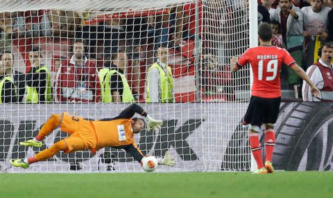 Sevilla goalie Beto saves a penalty shot by Benfica's Rodrigo during the Europa League soccer final between Sevilla and Benfica, at the Turin Juventus stadium in Turin, Italy, Wednesday, May 14, 2014. Sevilla beat Benfica 4-2 on penalties to win Europa League final (AP Photo/Andrew Medichini)