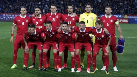 FILE - In this Monday, Oct. 9, 2017 filer, Serbian players pose for a team photo prior to the World Cup Group D qualifying soccer match between Serbia and Georgia at the Rajko Mitic stadium in Belgrade, Serbia. (AP Photo/Darko Vojinovic)