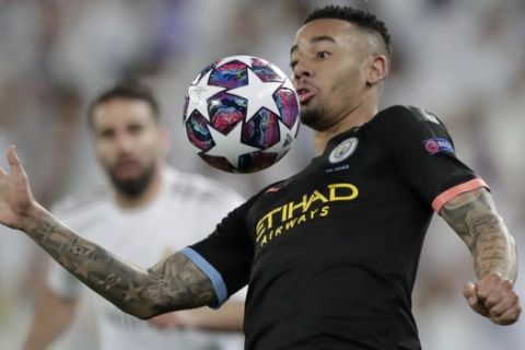 Manchester City's Gabriel Jesus controls the ball during the round of 16 first leg Champions League soccer match between Real Madrid and Manchester City at the Santiago Bernabeu stadium in Madrid, Spain, Wednesday, Feb. 26, 2020. (AP Photo/Bernat Armangue)