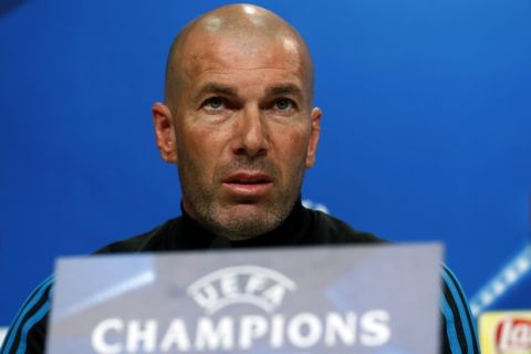 Real Madrid's head coach Zinedine Zidane attends a news conference in Munich, Germany, Tuesday, April 24, 2018. FC Bayern Munich will face Real Madrid for a Champions League semi final first leg soccer match in Munich on Wednesday, April 25, 2018. (AP Photo/Matthias Schrader)
