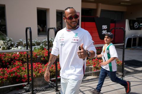 Mercedes driver Lewis Hamilton of Britain arrives for the third Formula One free practice at the Bahrain International Circuit in Sakhir, Bahrain, Saturday, March 4, 2023. The Bahrain GP will be held on Sunday March 5, 2023.(AP Photo/Ariel Schalit)