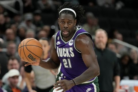 Milwaukee Bucks' Jrue Holiday during the second half of an NBA basketball game against the New York Knicks Friday, Oct. 28, 2022, in Milwaukee. The Bucks won 119-108. (AP Photo/Morry Gash)