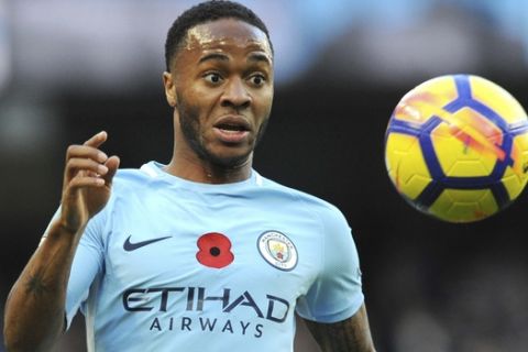 Manchester City's Raheem Sterling chases the ball during the English Premier League soccer match between Manchester City and Arsenal at Etihad stadium, Manchester, England, Sunday, Nov. 5, 2017. (AP Photo/Rui Vieira)