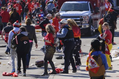 Police clear the area following a shooting at the Kansas City Chiefs NFL football Super Bowl celebration in Kansas City, Mo., Wednesday, Feb. 14, 2024. Multiple people were injured, a fire official said.(AP Photo/Reed Hoffmann)