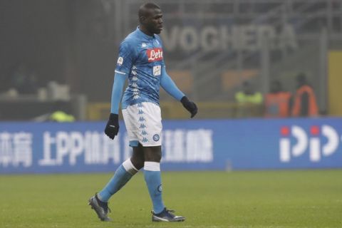 Napoli's Kalidou Koulibaly leaves the pitch after receiving a red card from the referee during a Serie A soccer match between Inter Milan and Napoli, at the San Siro stadium in Milan, Italy, Wednesday, Dec.26, 2018. (AP Photo/Luca Bruno)
