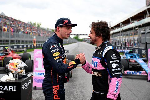 Red Bull driver Max Verstappen, of Netherlands, left, and Alpine driver Fernando Alonso, of Spain, shake hands after qualifying first and second respectively for the Formula One Canadian Grand Prix auto race in Montreal, Saturday, June 18, 2022. (Jim Watson/Pool Photo via AP)