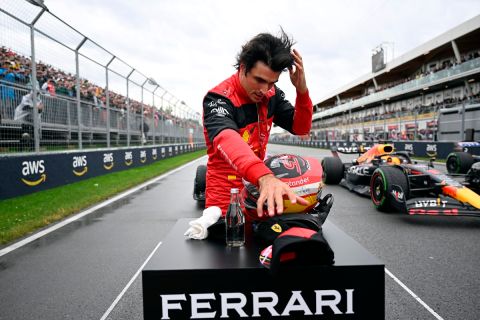 Ferrari driver Carlos Sainz, of Spain, takes off his gear after qualifying third for the Formula One Canadian Grand Prix auto race in Montreal, Saturday, June 18, 2022. (Jim Watson/Pool Photo via AP)