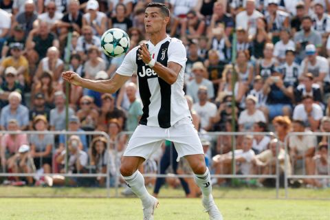 Juventus' Cristiano Ronaldo controls the ball during a friendly soccer match between the Juventus A and B teams, in Villar Perosa, near Turin, Italy, Sunday, Aug.12, 2018. (AP Photo/Antonio Calanni)