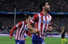 MADRID, SPAIN - MARCH 11:  Raul Garcia of  Club Atletico de Madrid celebrates after scoring Atletico's 3rd goal during the UEFA Champions League Round of 16, 2nd leg match between Club Atletico de Madrid v AC Milan at Vicente Calderon Stadium on March 11, 2014 in Madrid, Spain.  (Photo by Denis Doyle/Getty Images)