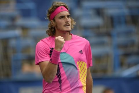Stefanos Tsitsipas, of Greece, reacts during a match against David Goffin, of Belgium, during the Citi Open tennis tournament, Friday, Aug. 3, 2018, in Washington. (AP Photo/Nick Wass)