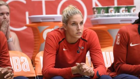 Washington Mystics forward Elena Delle Donne watches form the bench during the second half of Game 3 of a WNBA semifinals basketball playoff game against the Atlanta Dream, Friday, Aug. 31, 2018, in Washington. The Dream won 81-76. (AP Photo/Nick Wass)