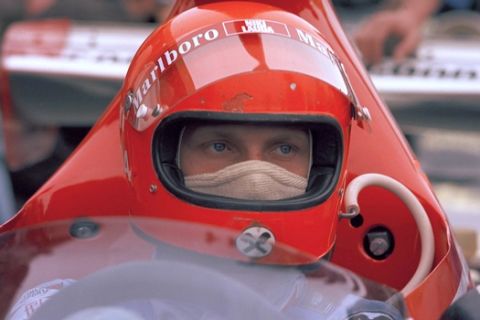 Austrian auto racer Niki Lauda, behind the wheel of the Ferrari 312-B3, during Argentine Grand Prix, Jan. 12, 1975. (AP Photo/E. Di Baia)