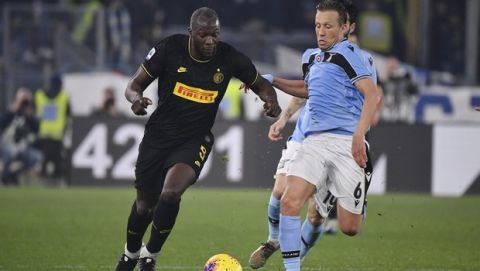 nter Milans Romelu Lukaku, left, and Lazios Lucas Leiva fight for the ball during the Serie A soccer match between Lazio and inter Milan, at Rome's Olympic stadium, Sunday, Feb. 16, 2020. (Alfredo Falcone/LaPresse via AP)