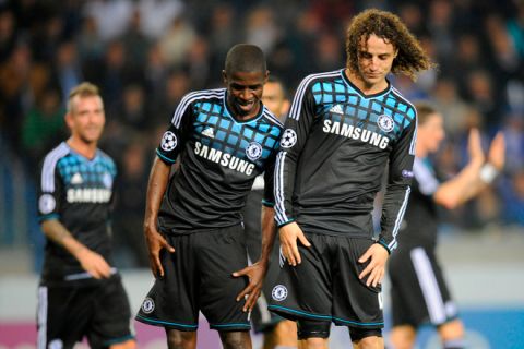 Chelsea's Ramires (L) and Chelsea's David Luiz (R) celebrate after scoring during the the UEFA Champions League Group E football match between Krc Genk and Chelsea at the Cristal Arena stadium in Genk on November 1, 2011. AFP PHOTO / JOHN THYS (Photo credit should read JOHN THYS/AFP/Getty Images)