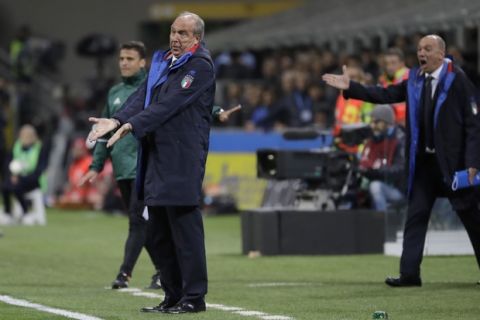 Italy coach Gian Piero Ventura, left, gestures during the World Cup qualifying play-off second leg soccer match between Italy and Sweden, at the Milan San Siro stadium, Italy, Monday, Nov. 13, 2017. (AP Photo/Luca Bruno)