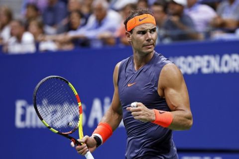 Rafael Nadal, of Spain, reacts to winning the third set against Dominic Thiem, of Austria, during the quarterfinals of the U.S. Open tennis tournament Tuesday, Sept. 4, 2018, in New York. (AP Photo/Adam Hunger)