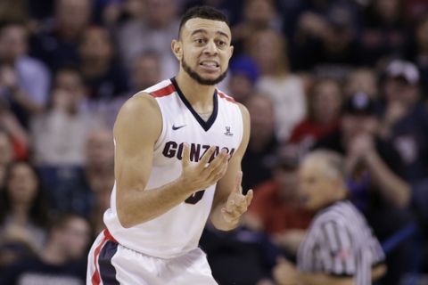 Gonzaga guard Nigel Williams-Goss speaks to his team during the second half of an NCAA college basketball game against BYU in Spokane, Wash., Saturday, Feb. 25, 2017. (AP Photo/Young Kwak)