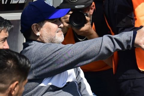 Diego Maradona, head coach of the Gimnasia y Esgrima La Plata, gives a thumbs up prior to his team's local tournament soccer match against Racing Club at Juan Carmelo Zerillo stadium in La Plata, Argentina, Sunday, Sept. 15, 2019. (AP Photo/Gustavo Garello)