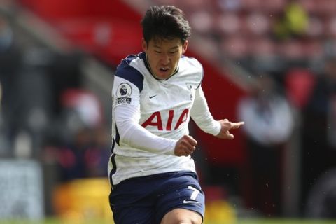 Tottenham's Son Heung-min scores his side's second goal during the English Premier League soccer match between Southampton and Tottenham Hotspur at St. Mary's Stadium in Southampton, England, Sunday, Sept. 20, 2020. (Cath Ivill/Pool via AP)
