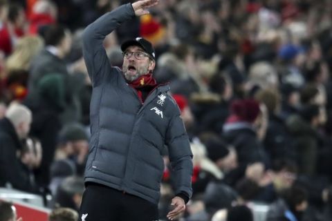 Liverpool's manager Jurgen Klopp gestures during the English Premier League soccer match between Liverpool and Manchester City at Anfield stadium in Liverpool, England, Sunday, Nov. 10, 2019. (AP Photo/Jon Super)
