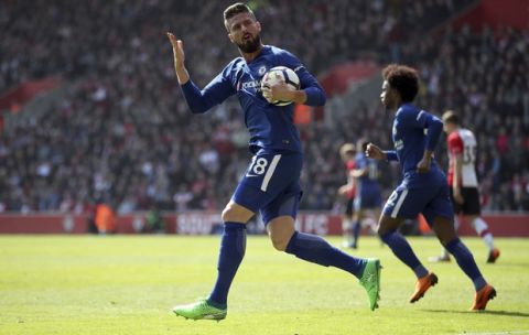 Chelsea's Olivier Giroud celebrates scoring his side's first goal of the game  during their English Premier League soccer match against Southampton at St Mary's Stadium, Southampton, England, Saturday, April 14, 2018. (Adam Davy/PA via AP)