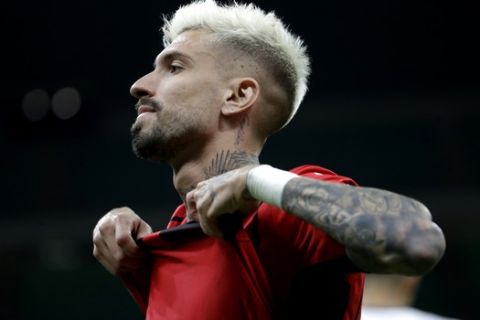 AC Milan's Samu Castillejo gestures after missing a scoring chance during a Serie A soccer match between AC Milan and Cagliari, at the San Siro stadium in Milan, Italy, Sunday, May 16, 2021. (AP Photo/Luca Bruno)