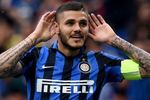 MILAN, ITALY - MAY 07:  Mauro Icardi of FC Internazionale celebrates after scoring the opening goal during the Serie A match between FC Internazionale Milano and Empoli FC  at Stadio Giuseppe Meazza on May 7, 2016 in Milan, Italy.  (Photo by Claudio Villa - Inter/Inter via Getty Images)