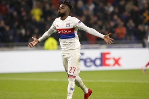 Lyon's Maxwel Cornet reacts after scoring the first goal during the Europa League, round of 16 second leg soccer match between Lyon and CSKA Moscow in Decines, near Lyon, central France, Thursday March 15, 2018. (AP Photo/Laurent Cipriani)