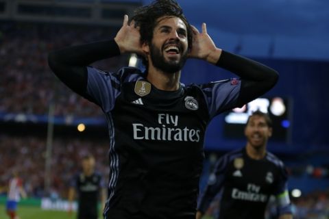 Real Madrid's Isco celebrates after scoring a goal during the Champions League semifinal second leg soccer match between Atletico Madrid and Real Madrid at the Vicente Calderon stadium in Madrid, Wednesday, May 10, 2017. (AP Photo/Francisco Seco)