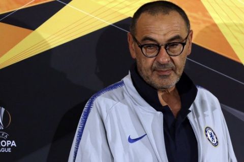 Chelsea's coach Maurizio Sarri arrives for the press conference in the northern Greek port city of Thessaloniki, Wednesday, Sept. 19, 2018. Chelsea will play against PAOK Thessaloniki on Thursday for the group L of Europa League. (AP Photo/Thanassis Stavrakis)