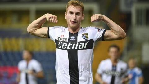 Parma's Dejan Kulusevski celebrates after scoring his side's second and winning goal on a penalty kick during the Italian Serie A soccer match between Parma and Napoli, at the Ennio Tardini stadium in Parma, Italy, Wednesday, July 22, 2020. (Massimo Paolone/LaPresse via AP)