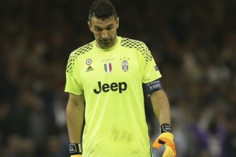 Juventus goalkeeper Gianluigi Buffon grimaces during the Champions League final soccer match between Juventus and Real Madrid at the Millennium Stadium in Cardiff, Wales, Saturday June 3, 2017. (AP Photo/Tim Ireland)