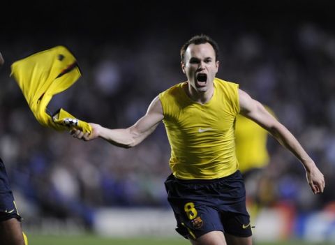 Barcelona´s midfielder Andrés Iniesta celebrates a goal against Chelsea during their Champions League semi-final, second-leg match against at the Stanford Bridge in London, May 6, 2009. AFP PHOTO/LLUIS GENE.