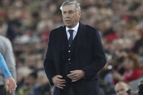 Napoli's head coach Carlo Ancelotti watches during the Champions League Group E soccer match between Liverpool and Napoli at Anfield stadium in Liverpool, England, Wednesday, Nov. 27, 2019. (AP Photo/Jon Super)