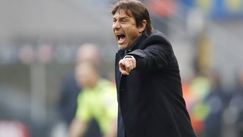 Inter Milan's head coach Antonio Conte gives instructions during the Serie A soccer match between Inter Milan and Cagliari at the San Siro Stadium, in Milan, Italy, Sunday, Jan. 26, 2020. (AP Photo/Antonio Calanni)