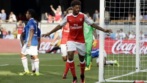 Arsenal forward Chuba Akpom, center, celebrates after scoring against the MLS All-Stars during the second half of the MLS All-Star soccer game Thursday, July 28, 2016, in San Jose, Calif. Arsenal won 2-1. (AP Photo/Marcio Jose Sanchez)