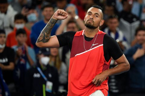 Nick Kyrgios of Australia reacts after defeating Liam Broady of Britain in their first round match at the Australian Open tennis championships in Melbourne, Australia, Tuesday, Jan. 18, 2022. (AP Photo/Andy Brownbill)