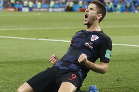 Croatia's Andrej Kramaric celebrates his side's opening goal during the quarterfinal match between Russia and Croatia at the 2018 soccer World Cup in the Fisht Stadium, in Sochi, Russia, Saturday, July 7, 2018. (AP Photo/Darko Bandic)