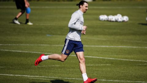 LA Galaxy's newest player Zlatan Ibrahimovic, of Sweden, runs during an MLS soccer training session at the StubHub Center, Friday, March 30, 2018, in Carson, Calif. (AP Photo/Ringo H.W. Chiu)