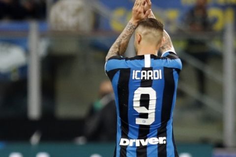 Inter Milan's Mauro Icardi waves to fans walks off the pitch to be replaced during the Serie A soccer match between Inter Milan and Empoli, at the San Siro Stadium in Milan, Italy, Sunday, May 26, 2019. (AP Photo/Antonio Calanni)