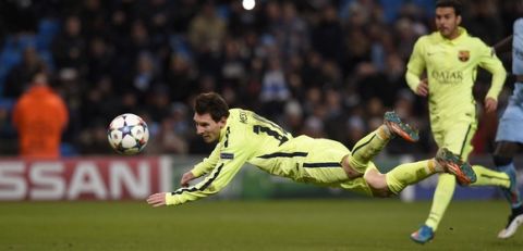 Barcelona's Argentinian forward Lionel Messi heads the ball wide off the rebound from his penalty that was saved by Manchester City's English goalkeeper Joe Hart during the UEFA Champions League round of 16 first leg football match between Manchester City and Barcelona at the Etihad Stadium in Manchester, northwest England, on February 24, 2015.  AFP PHOTO / LLUIS GENE        (Photo credit should read LLUIS GENE/AFP/Getty Images)