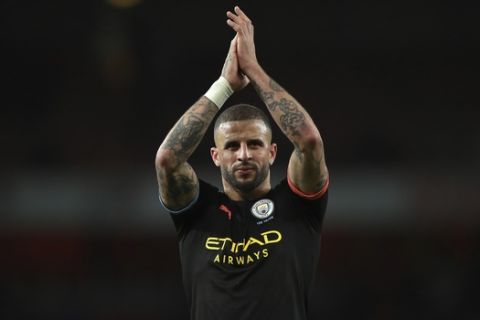 Manchester City's Kyle Walker applauds fans at the end of the English Premier League soccer match between Arsenal and Manchester City, at the Emirates Stadium in London, Sunday, Dec. 15, 2019. (AP Photo/Ian Walton)