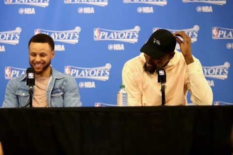 SALT LAKE CITY, UT - MAY 6:  Stephen Curry #30 and Kevin Durant #35 of the Golden State Warriors talk to the media after the game against the Utah Jazz during Game Three of the Western Conference Semifinals of the 2017 NBA Playoffs on May 6, 2017 at vivint.SmartHome Arena in Salt Lake City, Utah. NOTE TO USER: User expressly acknowledges and agrees that, by downloading and/or using this Photograph, user is consenting to the terms and conditions of the Getty Images License Agreement. Mandatory Copyright Notice: Copyright 2017 NBAE (Photo by Melissa Majchrzak/NBAE via Getty Images)