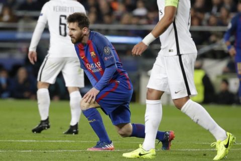 Barcelona's Lionel Messi stands during the Champions League round of 16, second leg soccer match between FC Barcelona and Paris Saint Germain at the Camp Nou stadium in Barcelona, Spain, Wednesday March 8, 2017. (AP Photo/Emilio Morenatti)