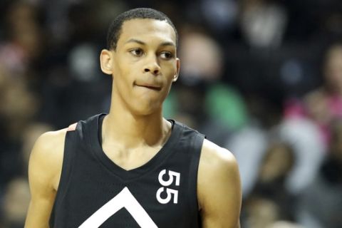 The Black Team's Darius Bazley #55 in action against the White Team during the Jordan Brand Classic high school basketball game, Sunday, April 8, 2018, in Brooklyn. (AP Photo/Gregory Payan)